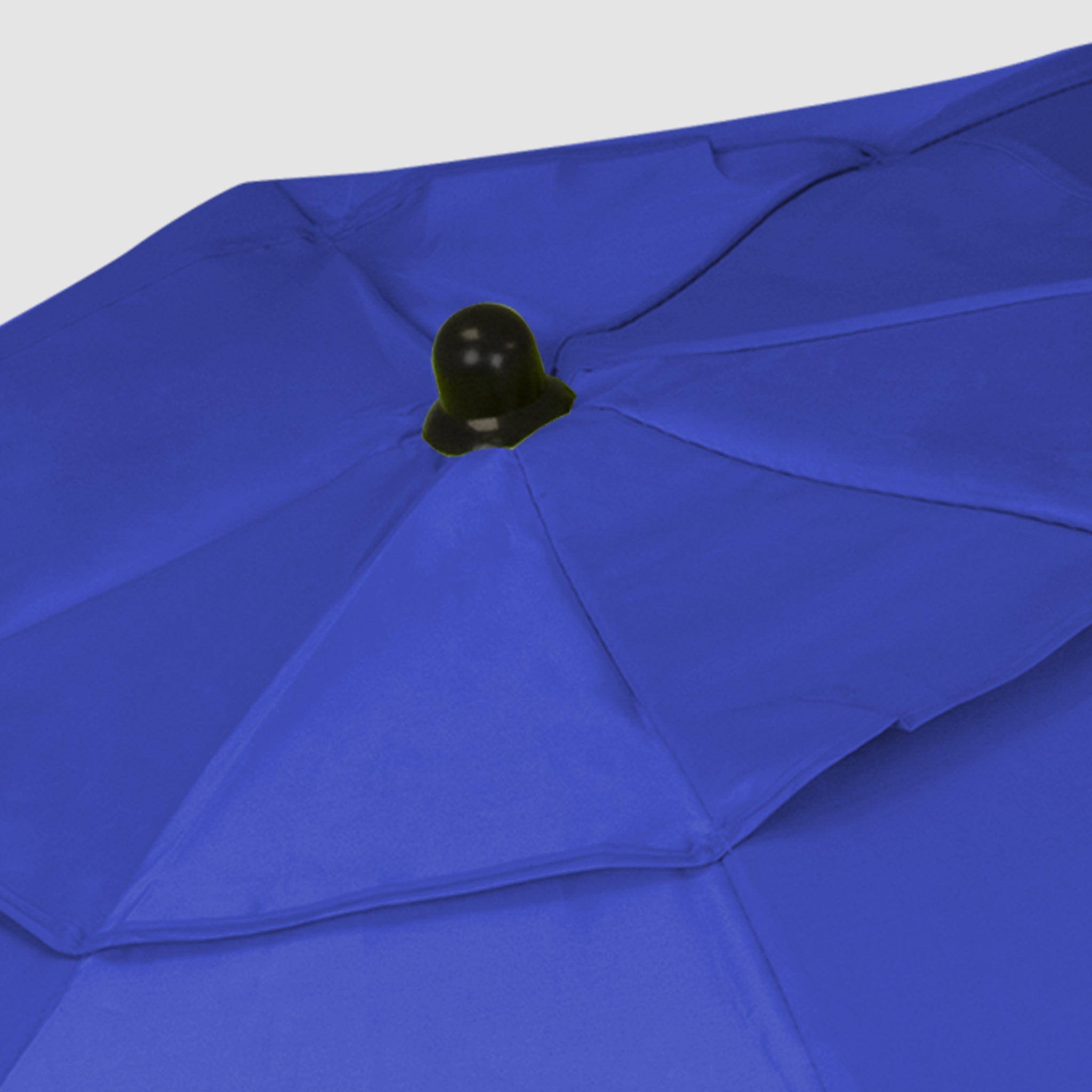 High-quality, robust Blue foldable beach umbrella with black cap on top.