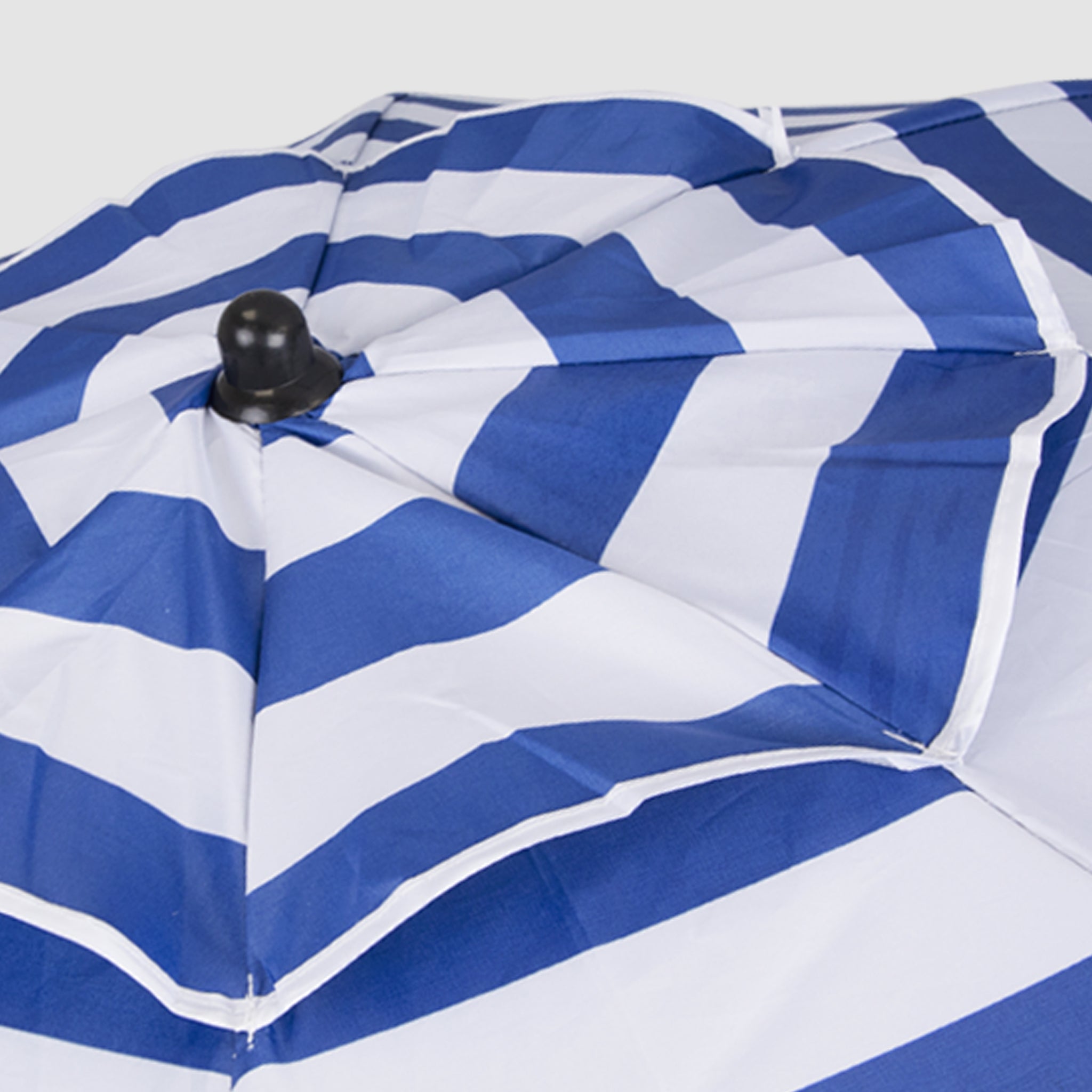 The high-quality, robust Blue-White Stripes foldable beach umbrella has a black cap at the top!