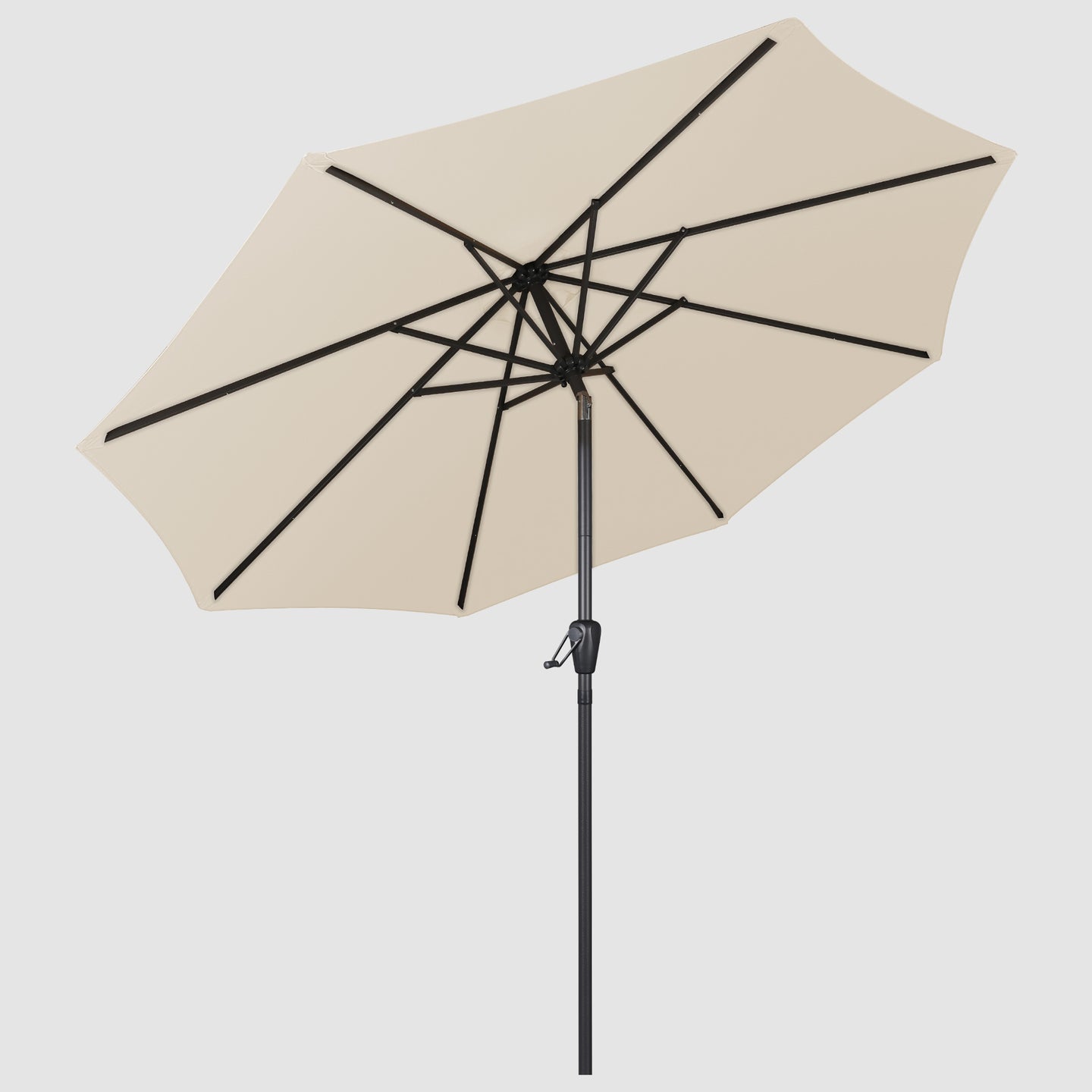 The open Beige best patio umbrella with a windproof hood is seen from below, the inner skeleton of the umbrella can be seen as well as the black pole. 