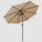 The open khaki best patio umbrella with a windproof hood is seen from below, the inner skeleton of the umbrella can be seen as well as the black pole. 